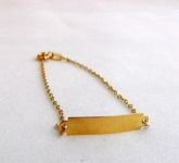 Pulseira Infantil. Modelo Placa em Ouro 18 kl(750)