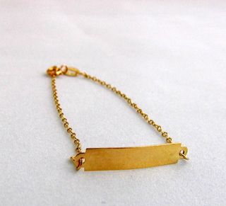 Pulseira Infantil. Modelo Placa em Ouro 18 kl(750)